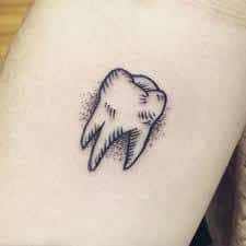 What Does Tooth Tattoo Mean? | Represent Symbolism