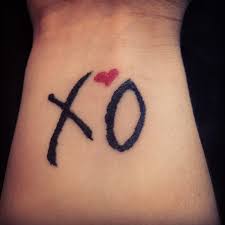 What Does XO Tattoo Mean? | Represent Symbolism